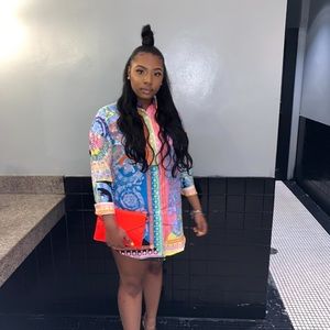 Long sleeve printed multicolored t-shirt dress.